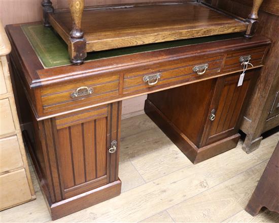 A late Victorian walnut pedestal desk W.120cm